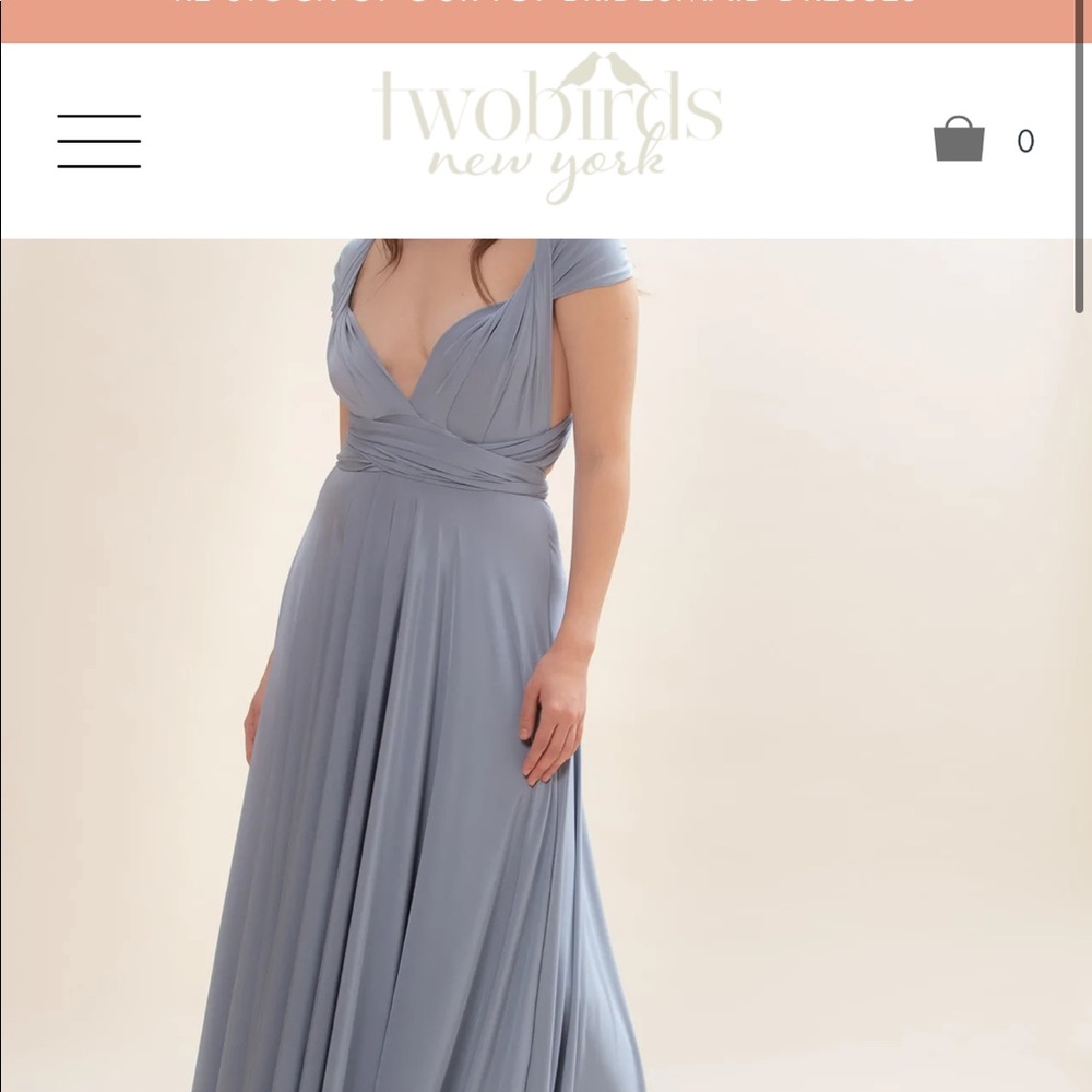 Two birds classic ball gown In dusty blue. Worn once bridesmaid dress.